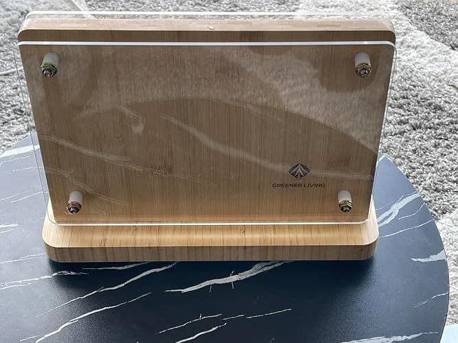 Customer photo of the back of the magnetic knife holder showing the acrylic shield and brand logo