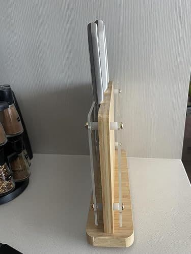 Customer side-view photo of the magnetic knife holder holding two knives