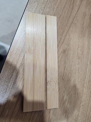 Customer photo of two individual bamboo divider pieces from the set