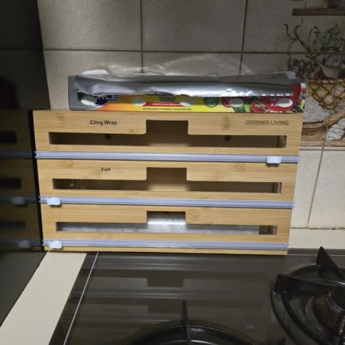 Customer photo of the loaded dispenser standing on a kitchen benchtop